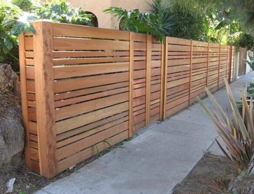 Enhance Your Property with a Timeless Wooden Fence: Installation and Contractor Selection
