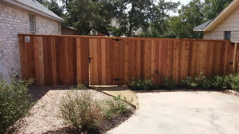Cedar wood privacy fence built by B.C. Fence Austin in the Austin area