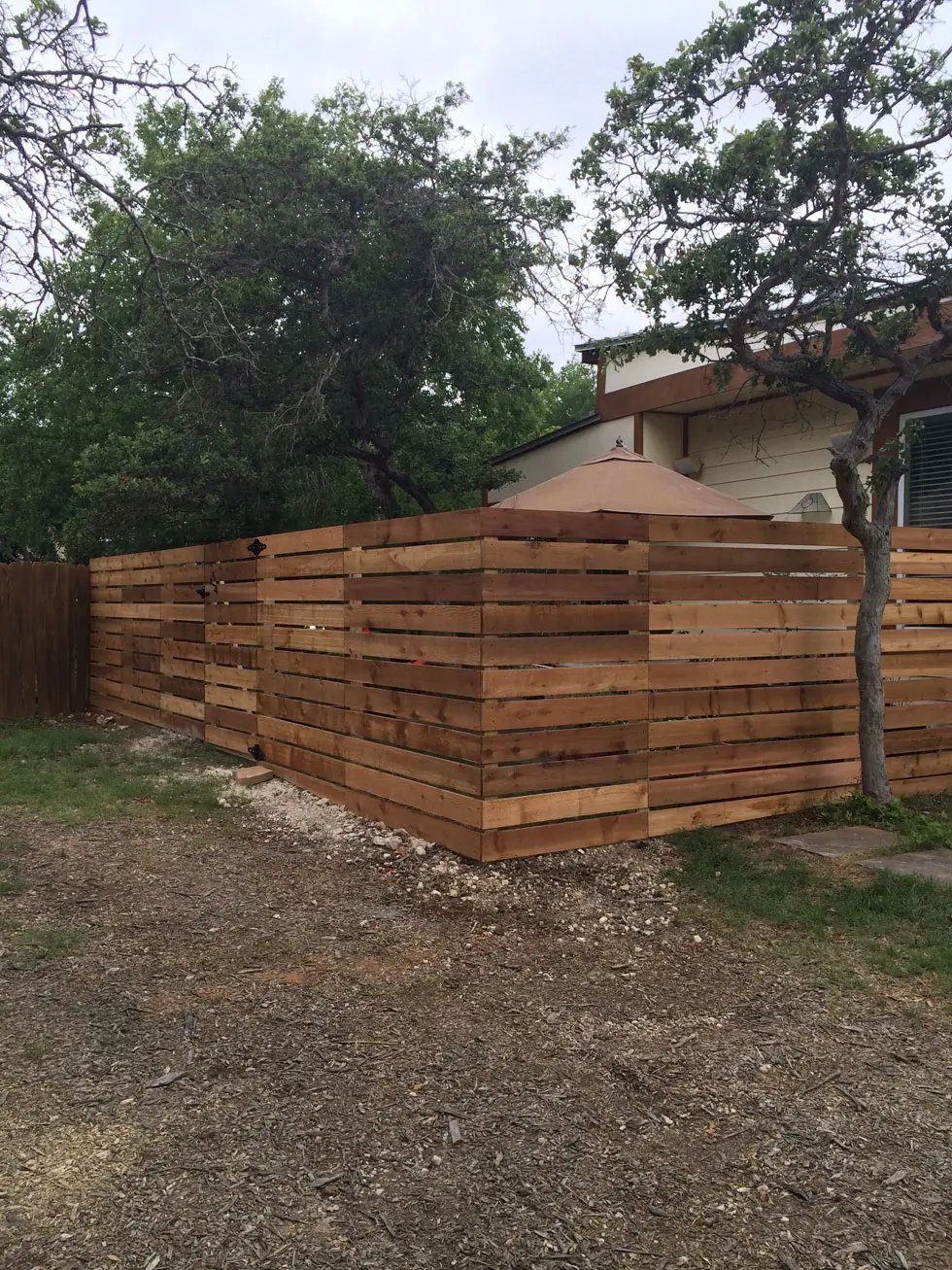 Cedar wood privacy fence built by B.C. Fence Austin in the Austin area